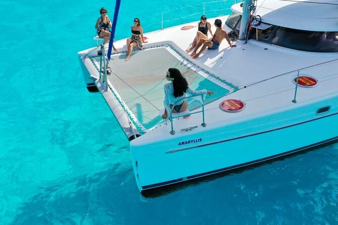Isla Mujeres: Catamaran Tour with Snorkeling Food, Drinks, Beach - Snorkeling near MUSA and what to expect underwater