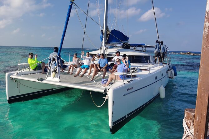 Isla Mujeres: Catamaran Tour with Snorkeling Food, Drinks, Beach - Sailing out from Cancun with an open bar