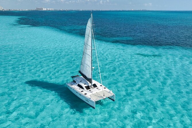 Isla Mujeres Catamaran Tour with Snorkeling, Open Bar & Buffet - Lunch at the beach club