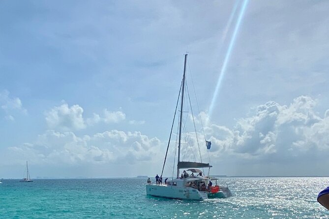 Isla Mujeres on luxury catamaran with snorkel, open bar and lunch - A catamaran day built around three different moods