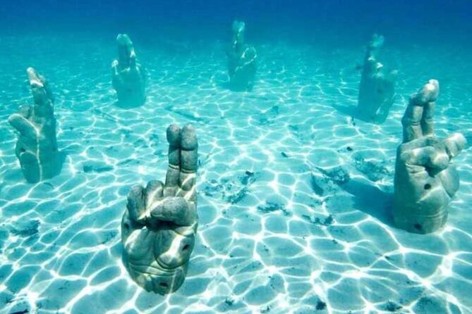 Isla Mujeres on luxury catamaran with snorkel, open bar and lunch - Who will enjoy this outing most?