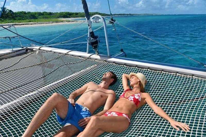 Isla Mujeres Plus Experience Catamaran Tour + Snorkel+Lunch - A seven-hour day on the Caribbean