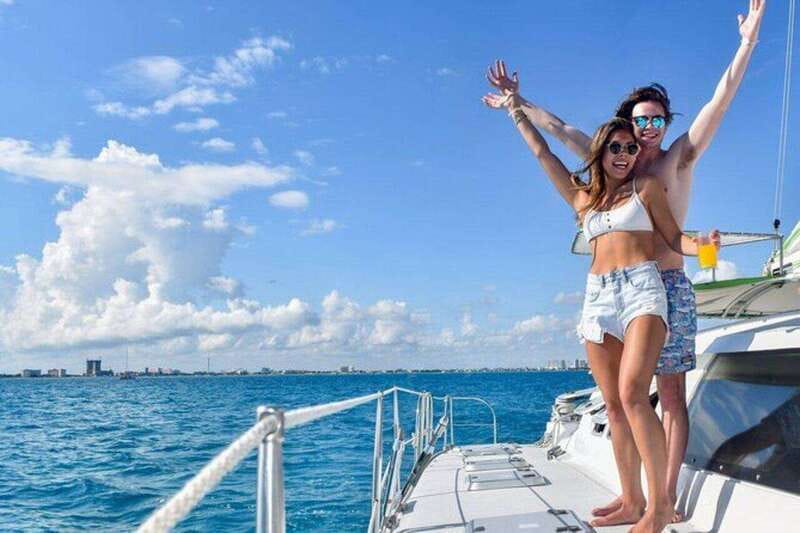 Isla Mujeres Plus Experience Catamaran Tour + Snorkel+Lunch - Sailing out from Cancun