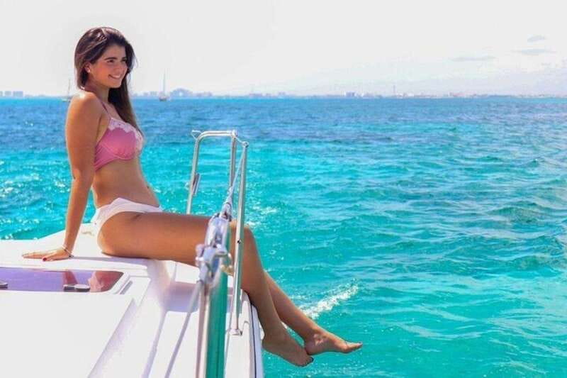 Isla Mujeres Plus Experience Catamaran Tour + Snorkel+Lunch - Isla Mujeres, with about three hours ashore
