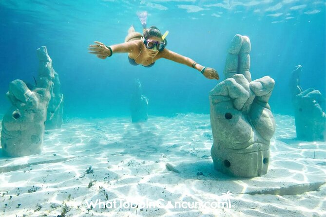 Isla Mujeres Premium Tour Transportation & Dock fee Included - Catamaran drinks, towels, and the practical details