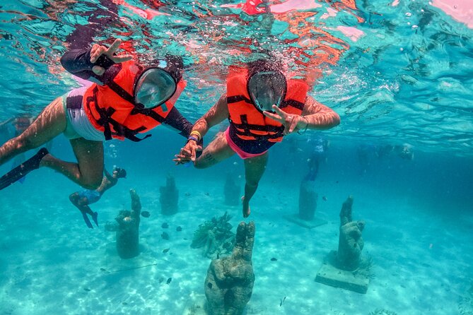 Isla Mujeres Spring Break Party Catamaran Snorkel and Open Bar - Setting sail from Playa Tortugas at 10:30 a.m.