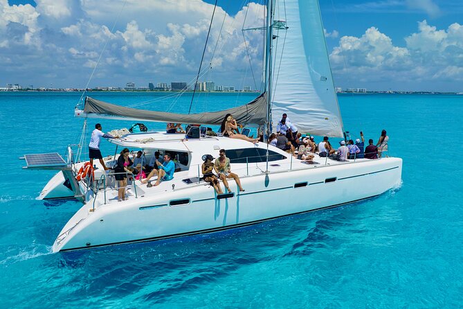 Isla Mujeres Spring Break Party Catamaran Snorkel and Open Bar - Lunch at the beach club