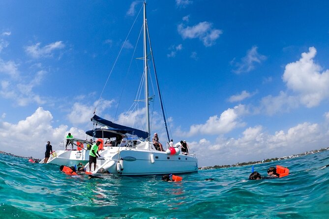 Isla Mujeres Tour on Catamaran with Snorkel, Open Bar, Buffet & Beach club - What to Pack and What to Budget
