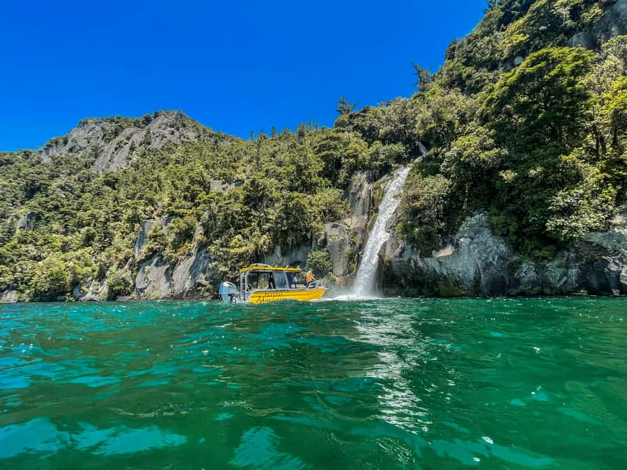 Kinloch: Lake Taupo Catamaran Cruise with Paddleboarding - Leaving Kinloch for the Western Bays