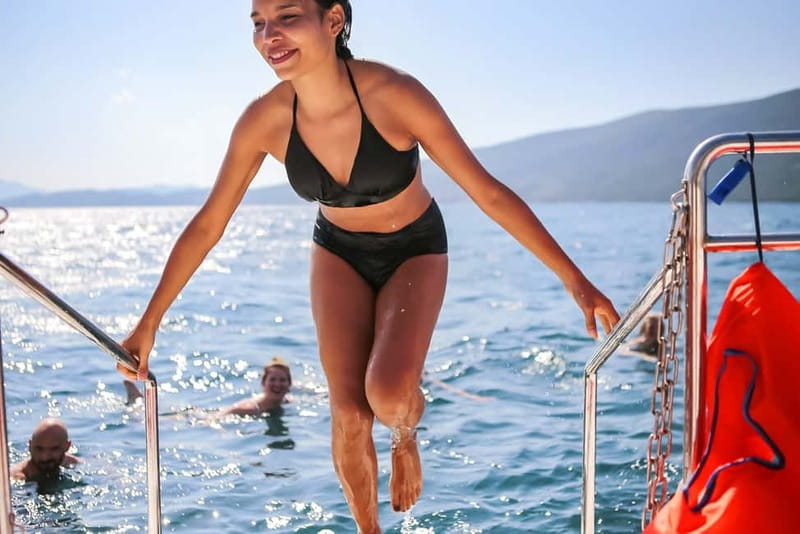 Kotor Bay: Full-Day Catamaran Cruise with Blue Cave Visit - Passing the length of UNESCO-protected Kotor Bay