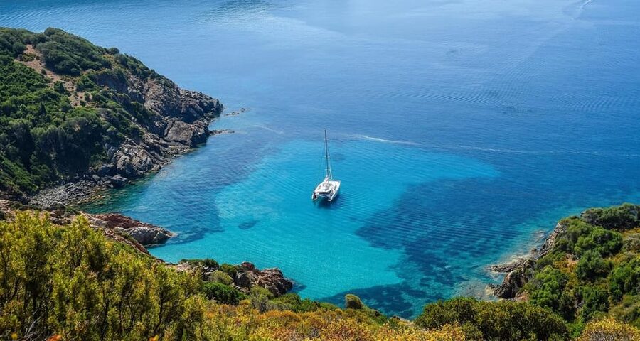 L'Île-Rousse, Corsica Catamaran Excursion: A Day in the Agriates Desert - Sailing toward Ghignu and L’Acciolu