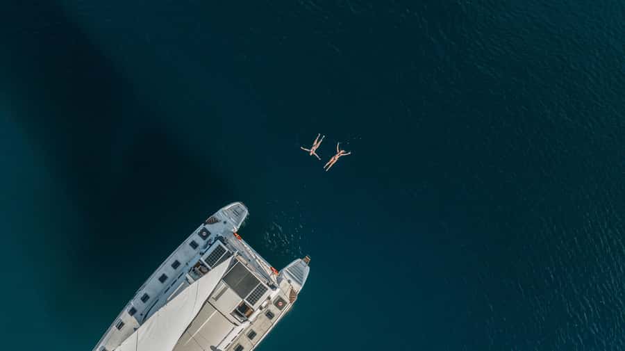 Lake Taupo: Luxury Sailing Catamaran to Māori Rock Carvings - Cruising across Great Lake Taupō