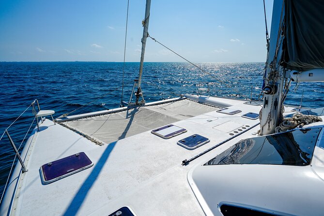 Laura Catamaran Private Tour to Isla Mujeres - Sunset on the return to port