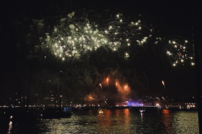 Lisbon NYE Fireworks Catamaran Cruise with Food and Drinks - A Warm Small-Group Setting