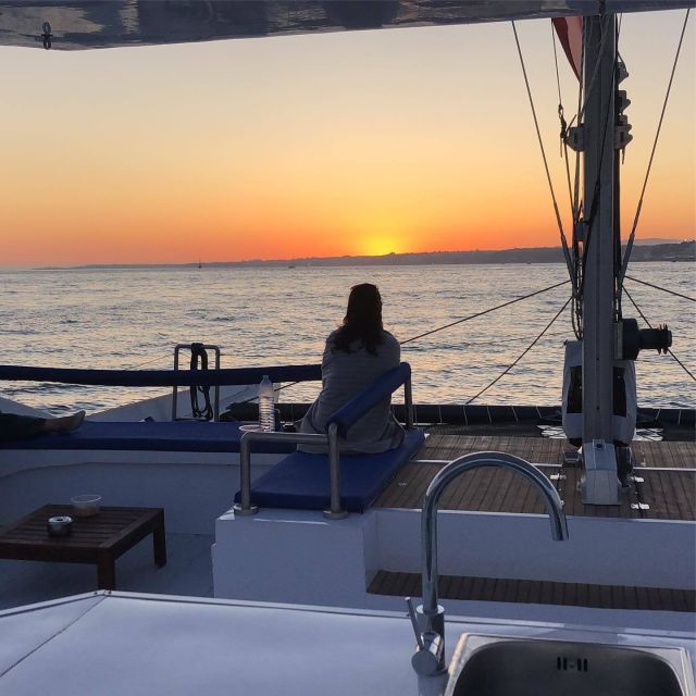 Lisbon: Private Catamaran Charter for up to 18-People - Reaching Christ statue across the river