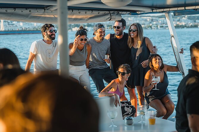 Lisbon: Sunset Catamaran Boat Tour with Music and Drinks - Nets or covered terrace: choose your spot wisely
