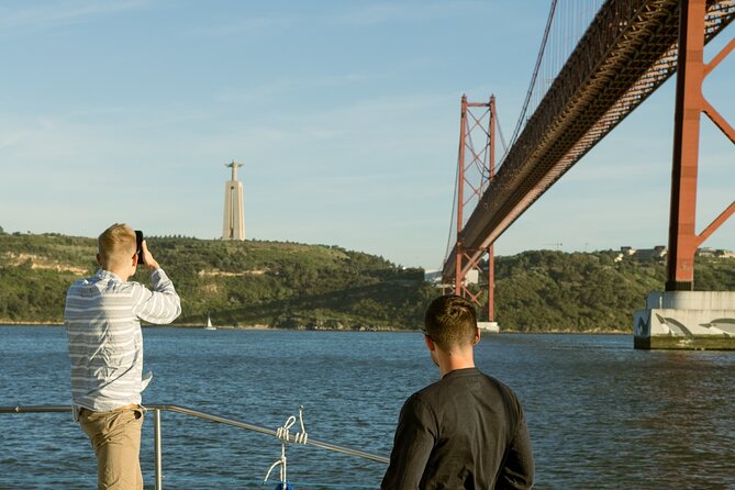 Lisbon: Sunset Catamaran Boat Tour with Music and Drinks - Boarding at Doca de Santo Amaro