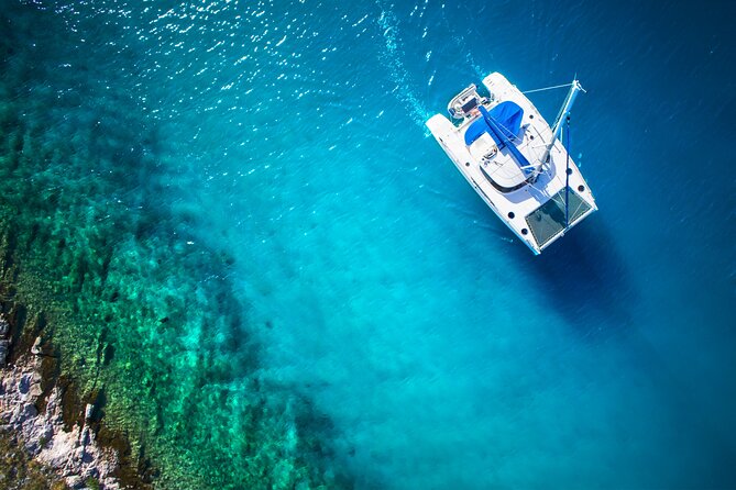 Live this unique experience. Catamaran to Isla Mujeres Tour. Open Bar included. - Key points to know before you book