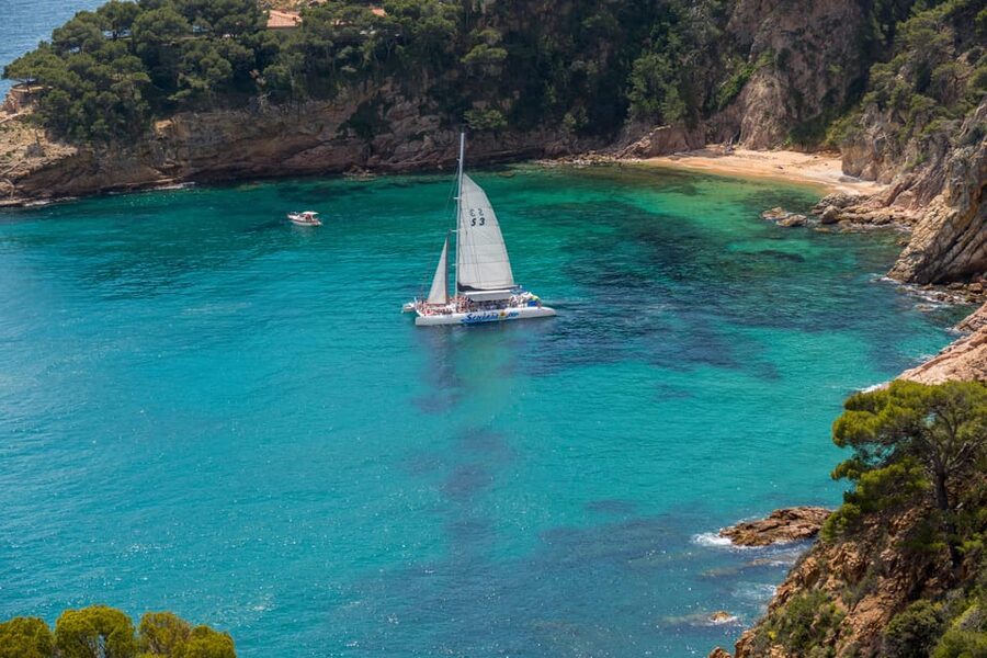 Lloret de Mar: Catamaran Sailing Cruise with BBQ and Drinks - Two hours at anchor for swimming and snorkeling