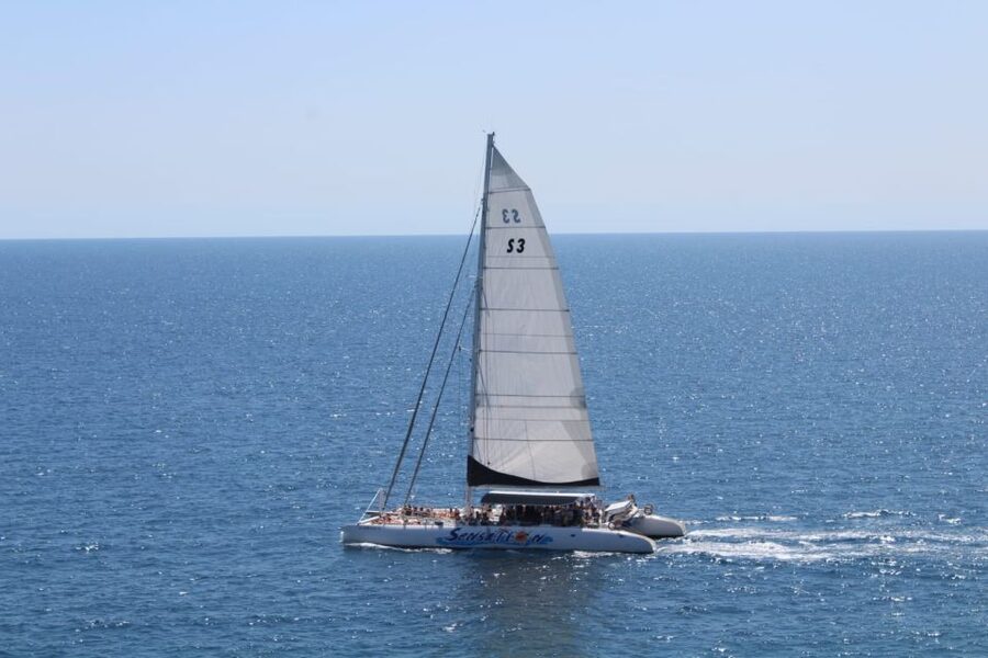 Lloret de Mar: Sunset Catamaran Cruise with DJ and Drinks - What to bring, and what to leave behind