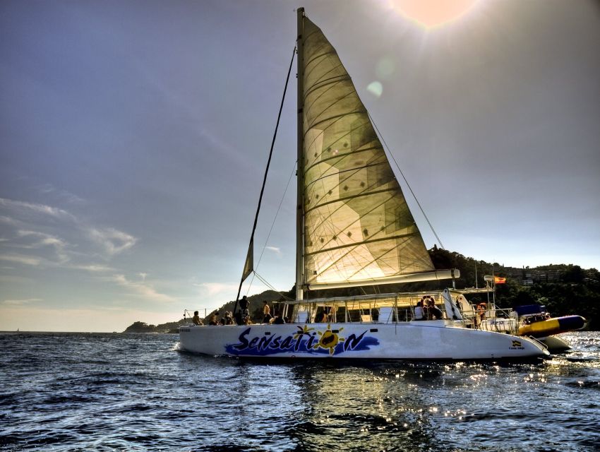 Lloret de Mar: Sunset Catamaran Cruise with DJ and Drinks - Starting at Passeig d’Agustí Font