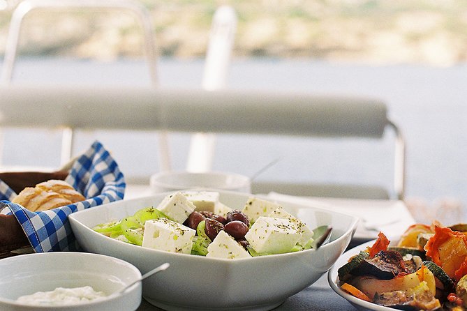 Luxury Catamaran Cruise Including pickup and Traditional Food - Greek food with the sea as your dining room