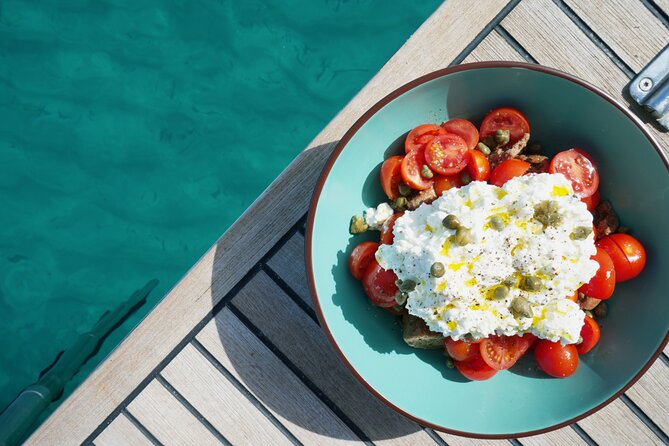 Luxury Catamaran Sunset Private & Greek Gastronomy in Athens - Vouliagmeni Beach and lunch from the onboard chef