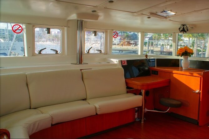 Luxury Catamaran Tour to Isla Mujeres with Transportation - What the $129 price includes, and what it does not