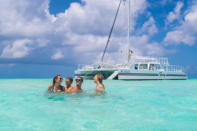 Luxury Cozumel Catamaran: Snorkel, Beach Club & Relaxation - Snorkeling with certified guides