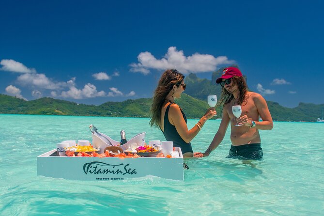 LUXURY PRIVATE Catamaran Bora Bora : Full-Day Trip - Watching rays through the catamaran nets