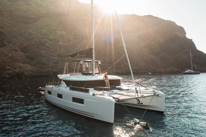 Majestic Catamaran Caldera Cruise with Snacks, Meal & Drinks - Captain Giannis, the crew, and the Black Pearl