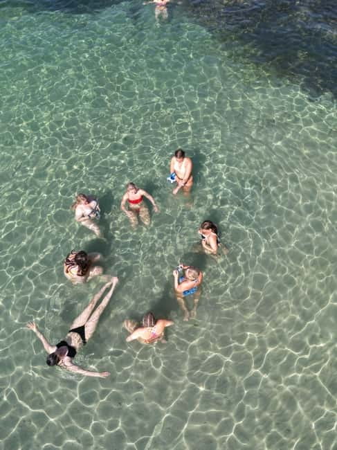 Majorca: Dinner aboard a private catamaran with snorkeling and paddle surfing - The 45-minute return with Palma lights