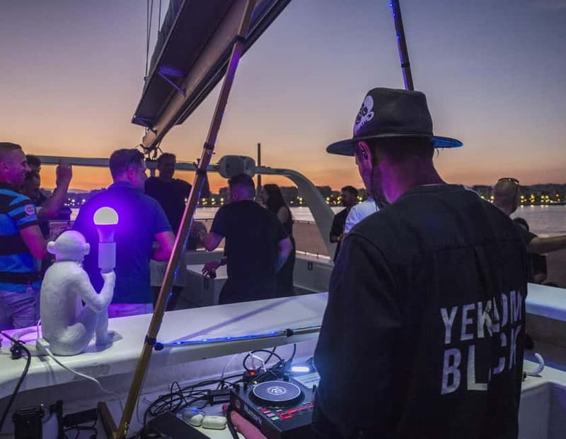 Malaga: Catamaran Sunset or Night Cruise w/ Live DJ & Drink - The upper deck becomes the social center
