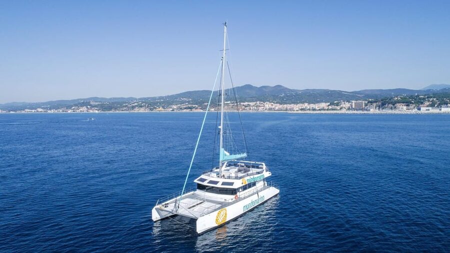 Malaga: Sailing Catamaran with Swimming and Paella Lunch - Paella, salad, bread, and fruit on deck