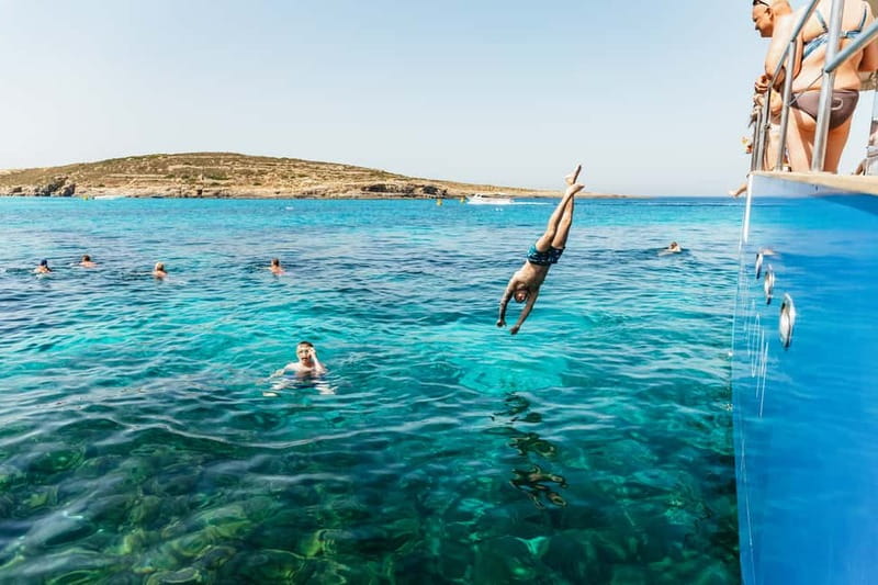 Malta: Blue Lagoon, Beaches & Bays Trip by Catamaran - Crystal Lagoon, Cliffs, and Caves