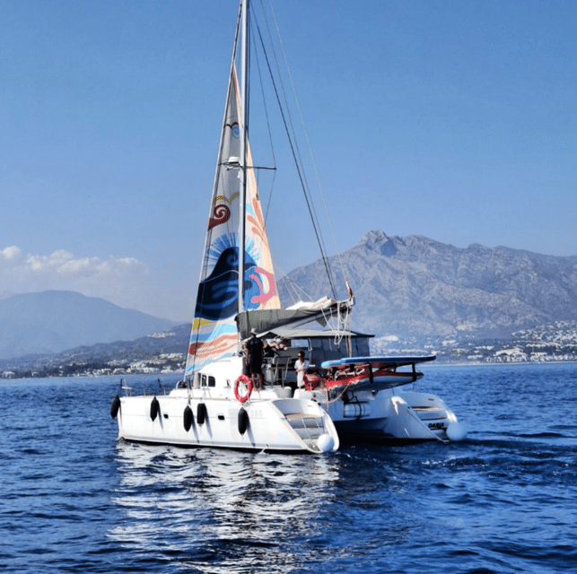 Marbella: Group Dolphin Watching Catamaran Tour with Snacks - Setting out from Puerto José Banús