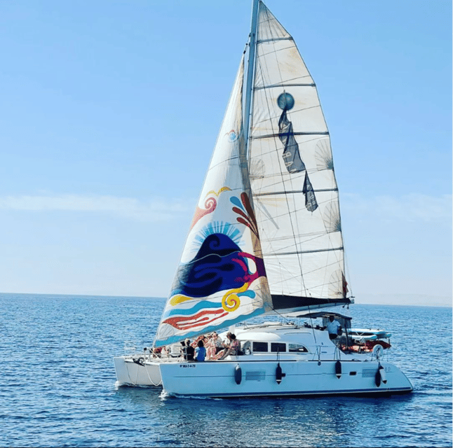 Marbella: Group Dolphin Watching Catamaran Tour with Snacks - What two hours on Daria feels like
