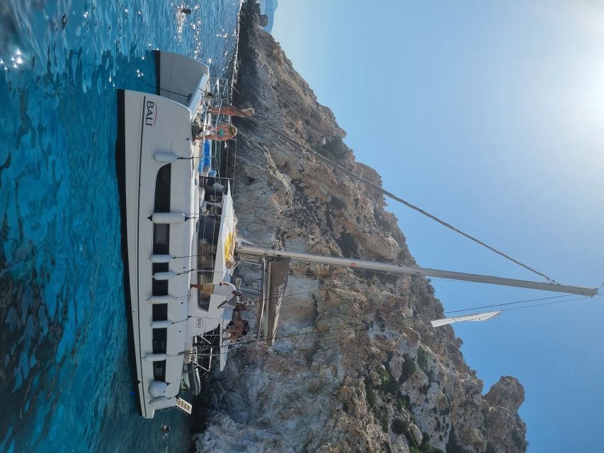 Milos: Full-Day Catamaran Cruise with Food and Open Bar - Gerakas pairs swimming with lunch