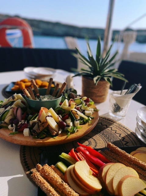 Milos: Kleftiko Sunset Catamaran Cruise with Meal & Drinks - Starting at Adamantas with coffee and snacks