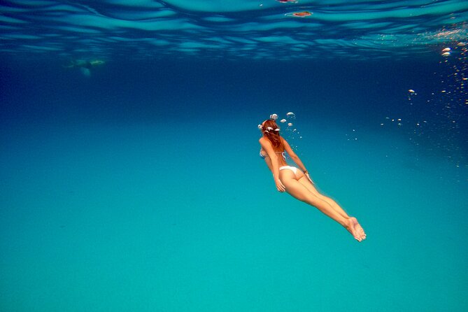Milos & Poliegos Catamaran Cruise Homemade Full menu BBQ & Drinks - Kleftiko’s caves, cliffs, and clear water