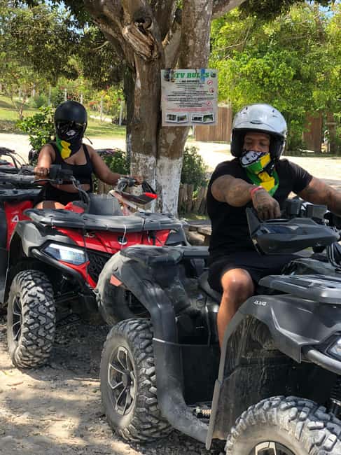 Montego Bay: ATV, Zipline, Catamaran, and Horseback Tour - Ziplining above the Jamaican countryside