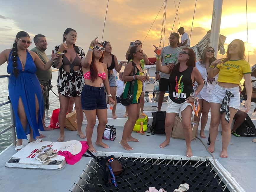 Montego Bay: ATV, Zipline, Catamaran, and Horseback Tour - Catamaran cruising and snorkeling in clear water