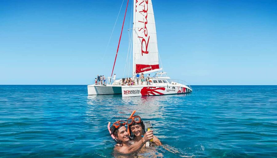 Montego Bay: Reggae Catamaran 18+ Cruise with Open Bar - A quick snorkel in clear Jamaican water