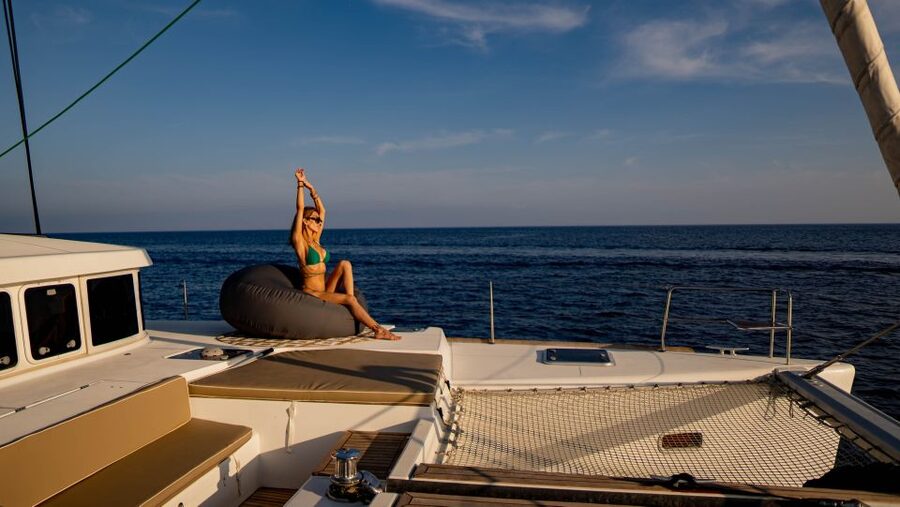 Mykonos: Boho Experience Catamaran Cruise - Sailing toward Delos