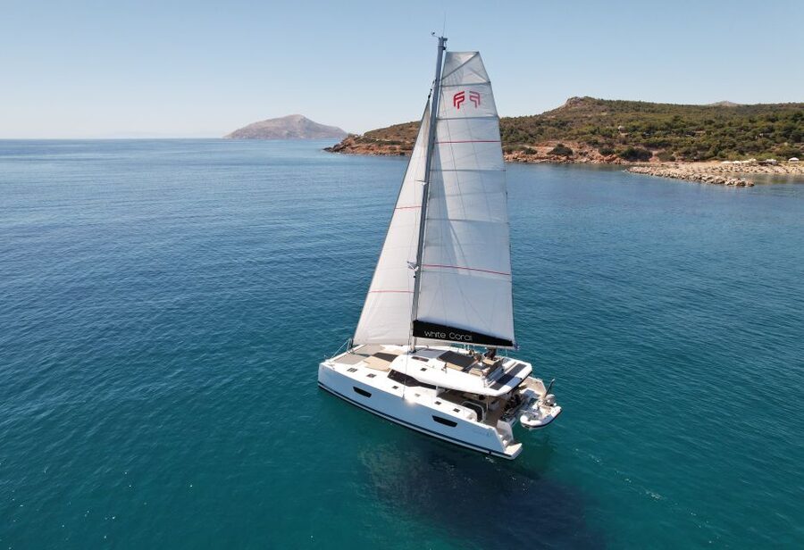 Mykonos: Catamaran Cruise with 3-Course Meal and Transfers - The 80-minute cruise toward Rhenia