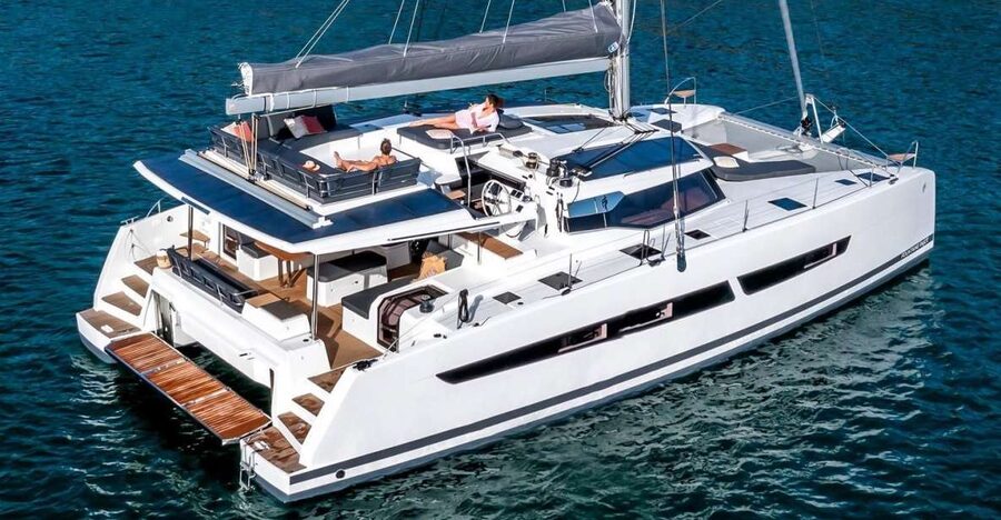 Mykonos: Catamaran Cruise with 3-Course Meal and Transfers - Rhenia swimming, snorkeling, and water sports