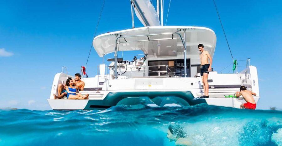 Mykonos: Catamaran Cruise with Lunch, Drinks and Transfer - Rhenia is the heart of the trip