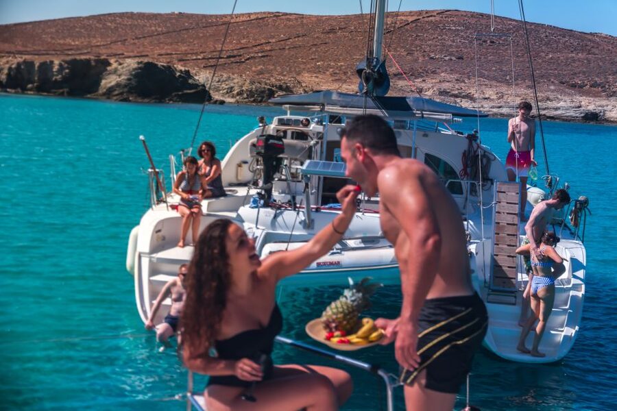 Mykonos: Catamaran Cruise with Lunch, Drinks and Transfer - The return to Mykonos and sunset option