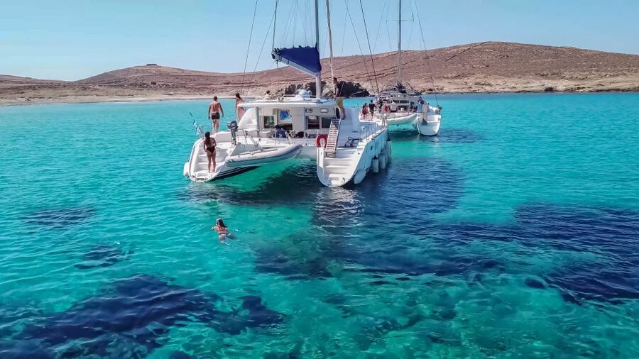 Mykonos: Catamaran Cruise with Lunch, Drinks and Transfer - Rough water, route changes, and comfort