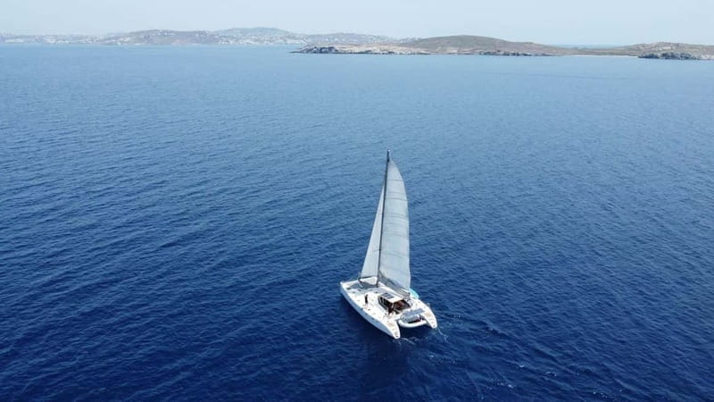 Mykonos: Catamaran Cruises with Lunch and Drinks - Leaving Ornos Deck for a full day at sea